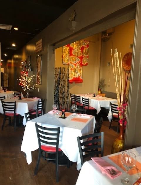 Dining room at Mix Pacific Rim on University Avenue with white-linen tables and warm lighting